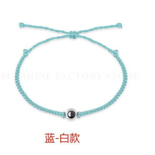 Pulsera tejida con proyección de lenguaje fotográfico