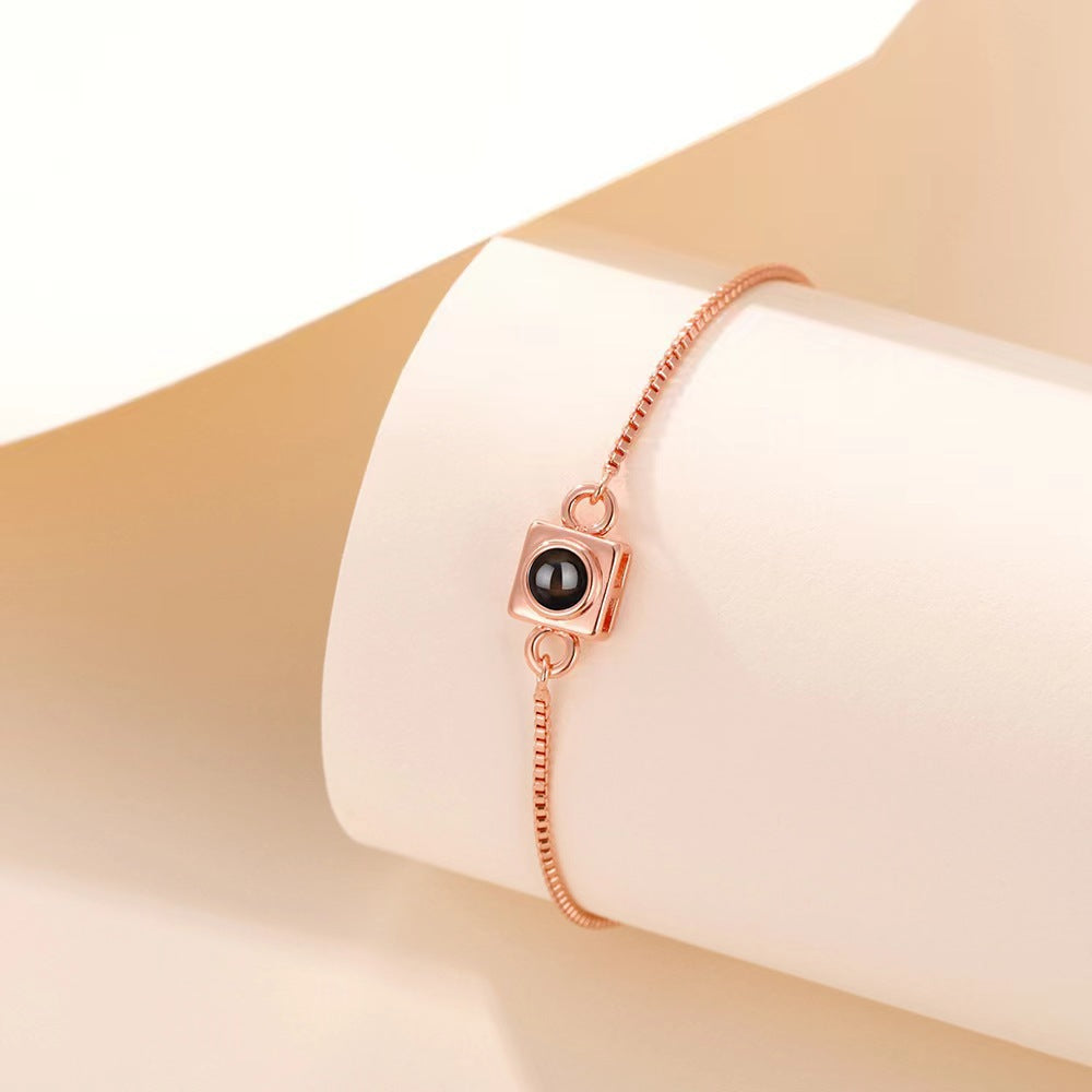 Pulsera con caja para proyector de fotos