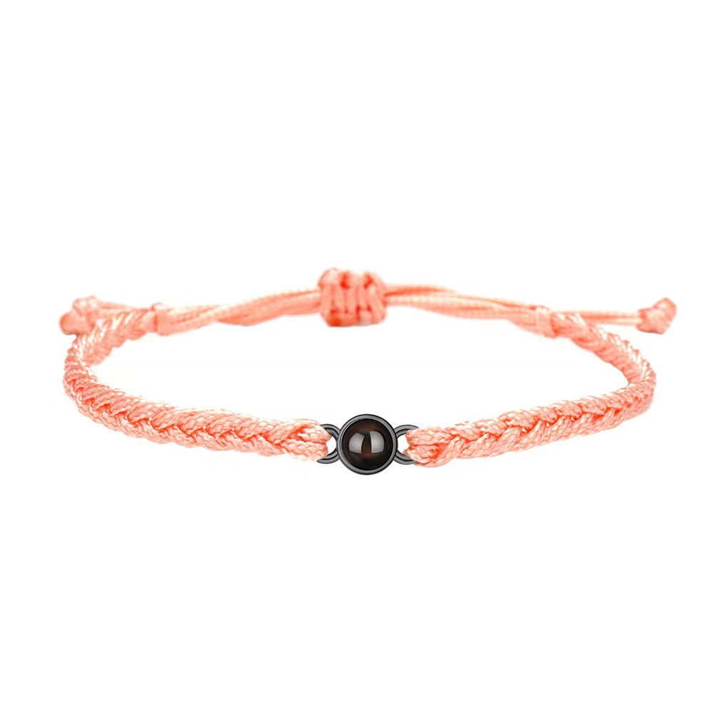 Pulsera tejida a mano con proyección de fotos