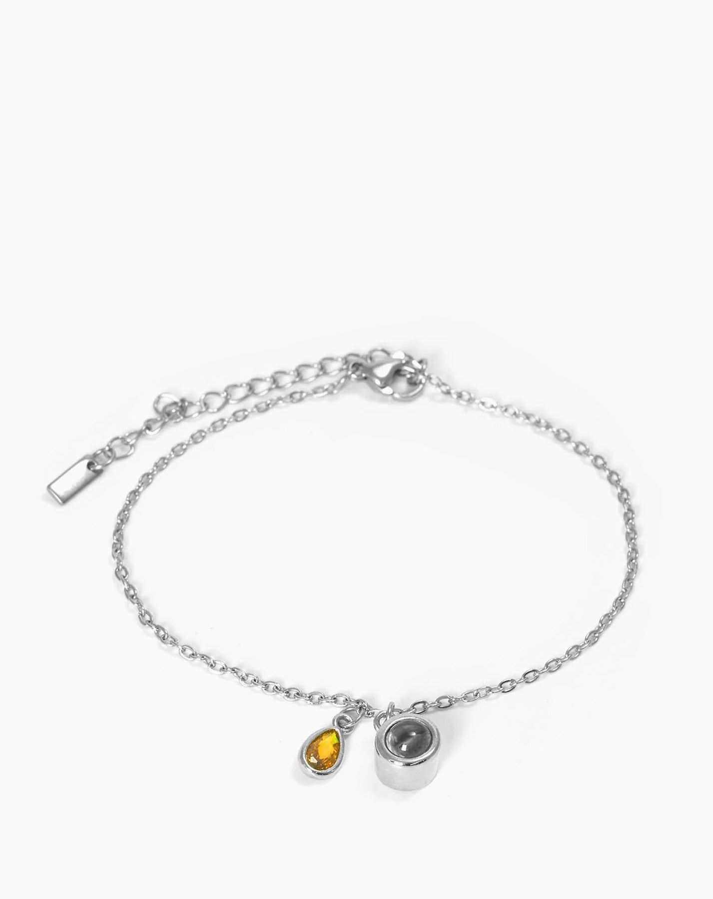 Pulsera con piedra del zodiaco en forma de gota de agua con proyección fotográfica