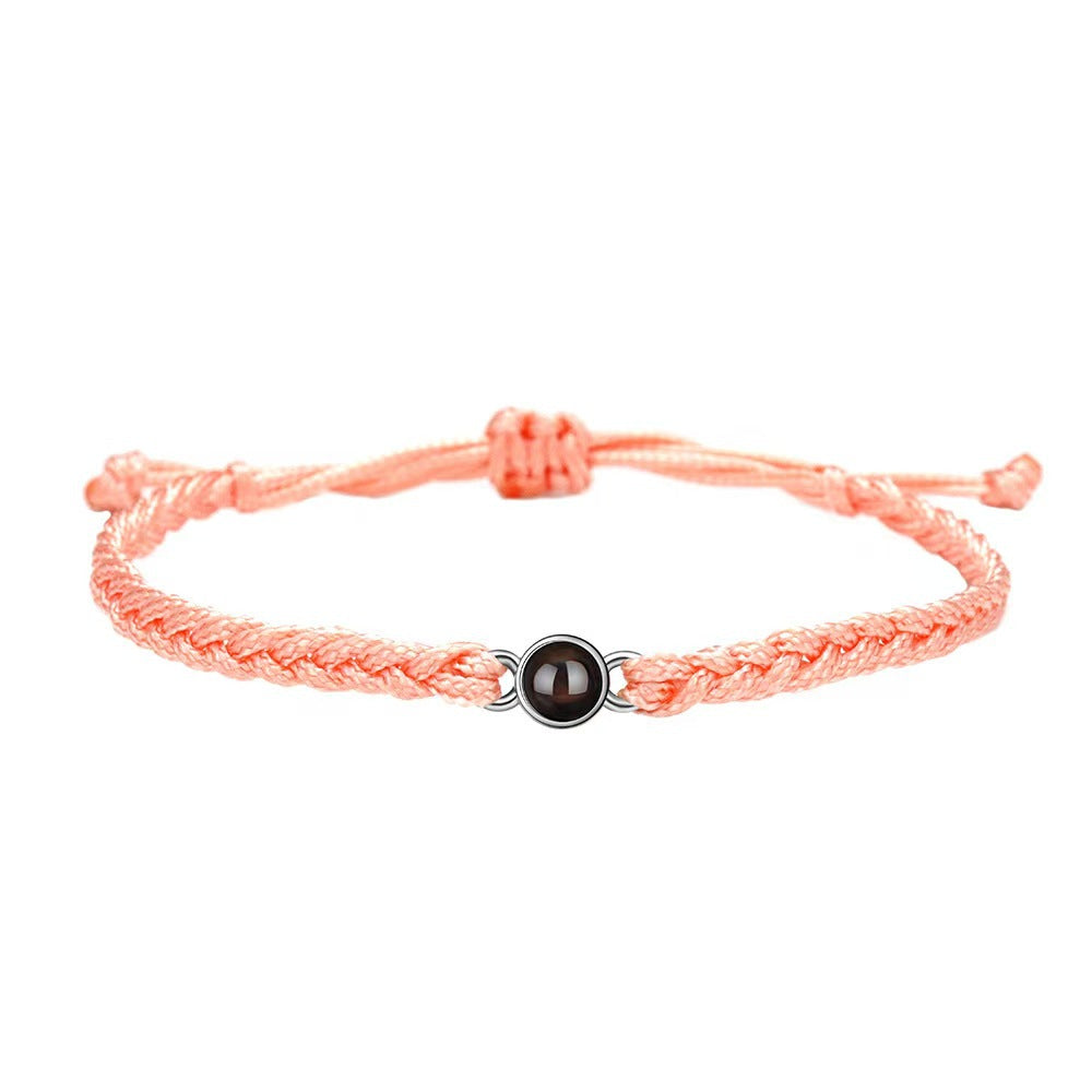 Pulsera tejida a mano con proyección de fotos