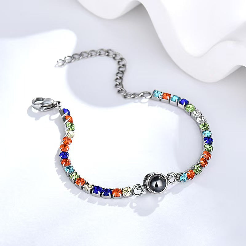Pulsera fotográfica con proyección de diamantes de colores
