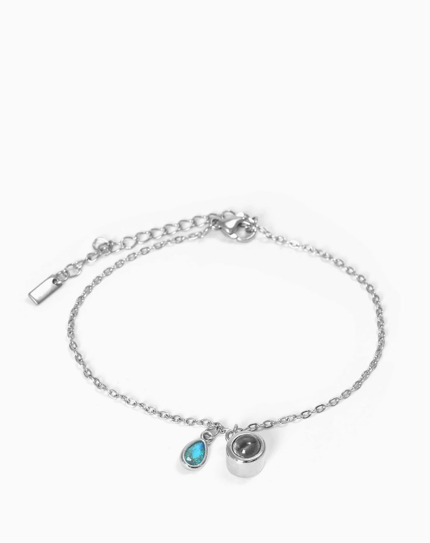 Pulsera con piedra del zodiaco en forma de gota de agua con proyección fotográfica