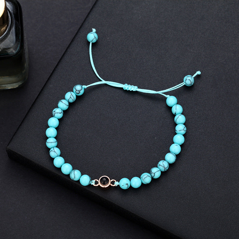 Pulsera turquesa con proyección de fotos