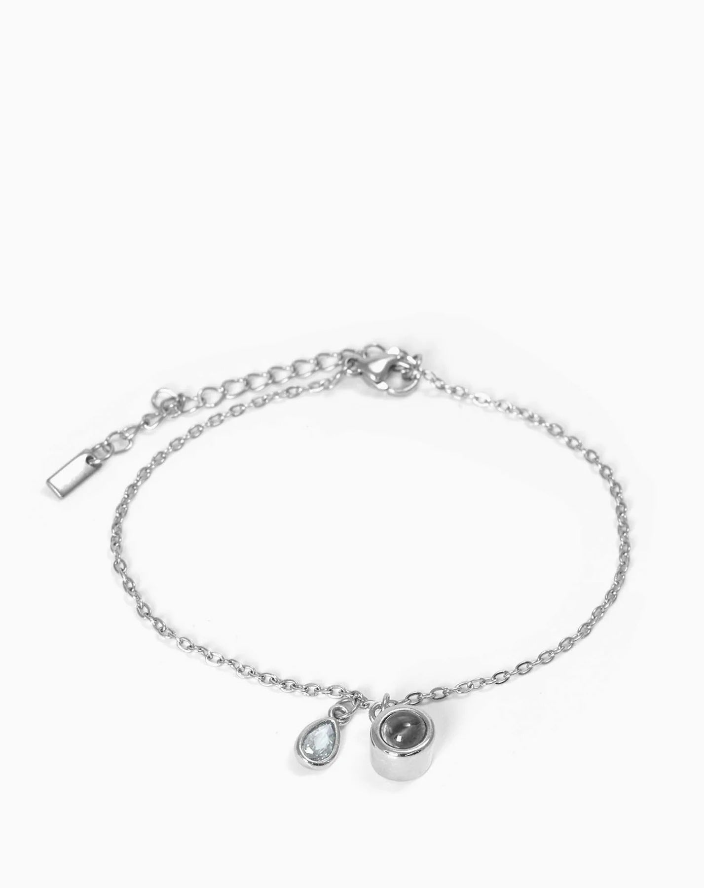Pulsera con piedra del zodiaco en forma de gota de agua con proyección fotográfica