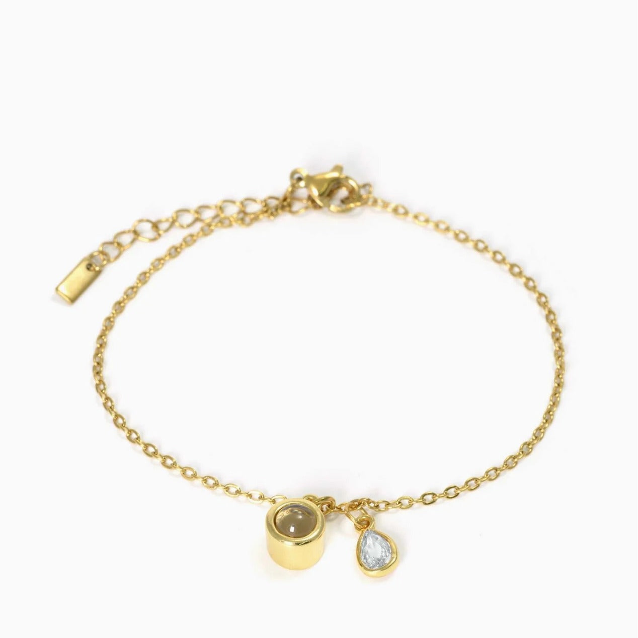 Pulsera con piedra del zodiaco en forma de gota de agua con proyección fotográfica