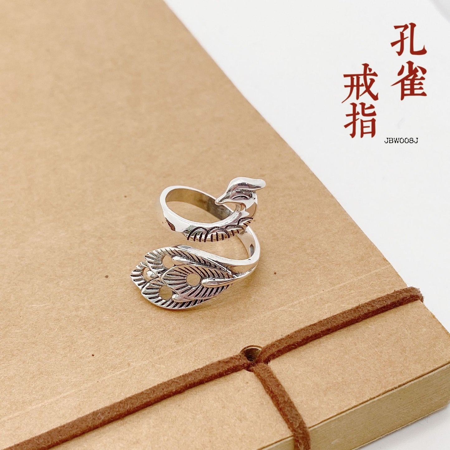 Anillo étnico de pavo real en plata de ley