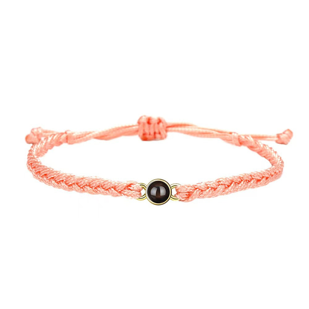 Pulsera tejida a mano con proyección de fotos