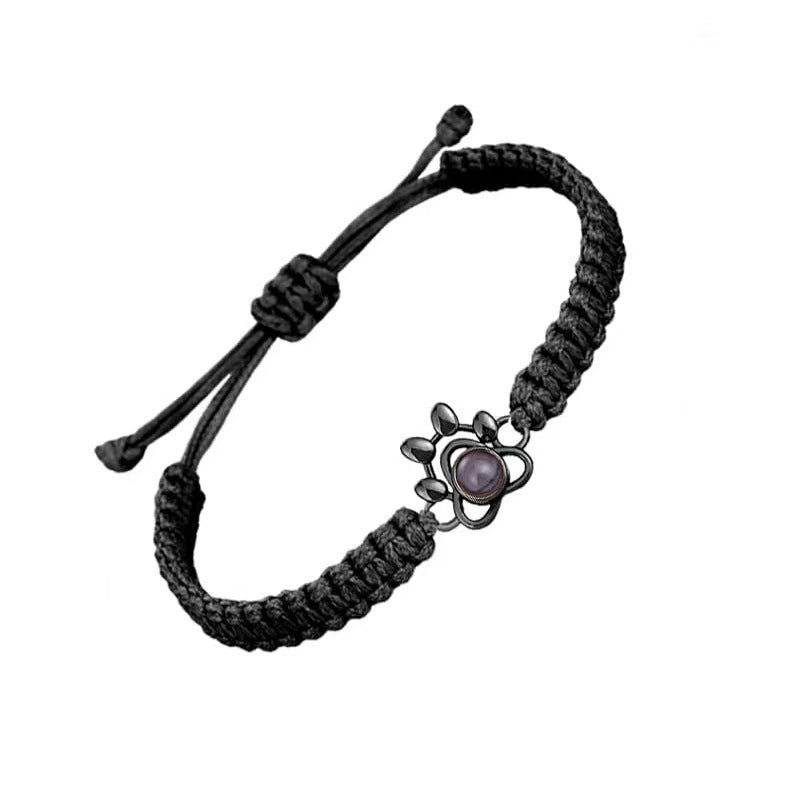Pulsera tejida con proyección de fotos de pata de perro