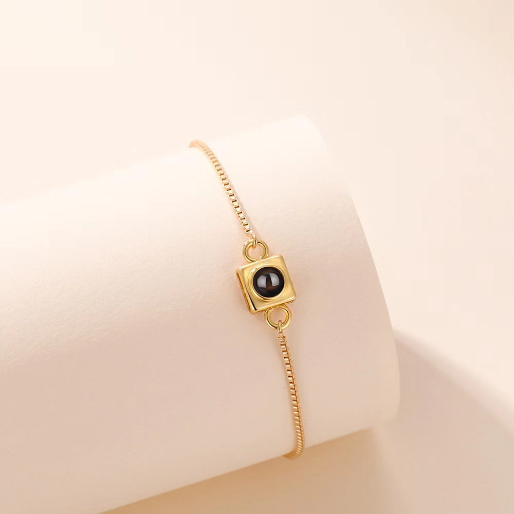 Pulsera con caja para proyector de fotos