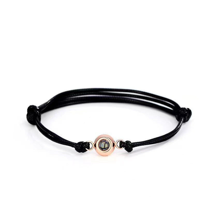 Photo projection pearl woven cord bracelet