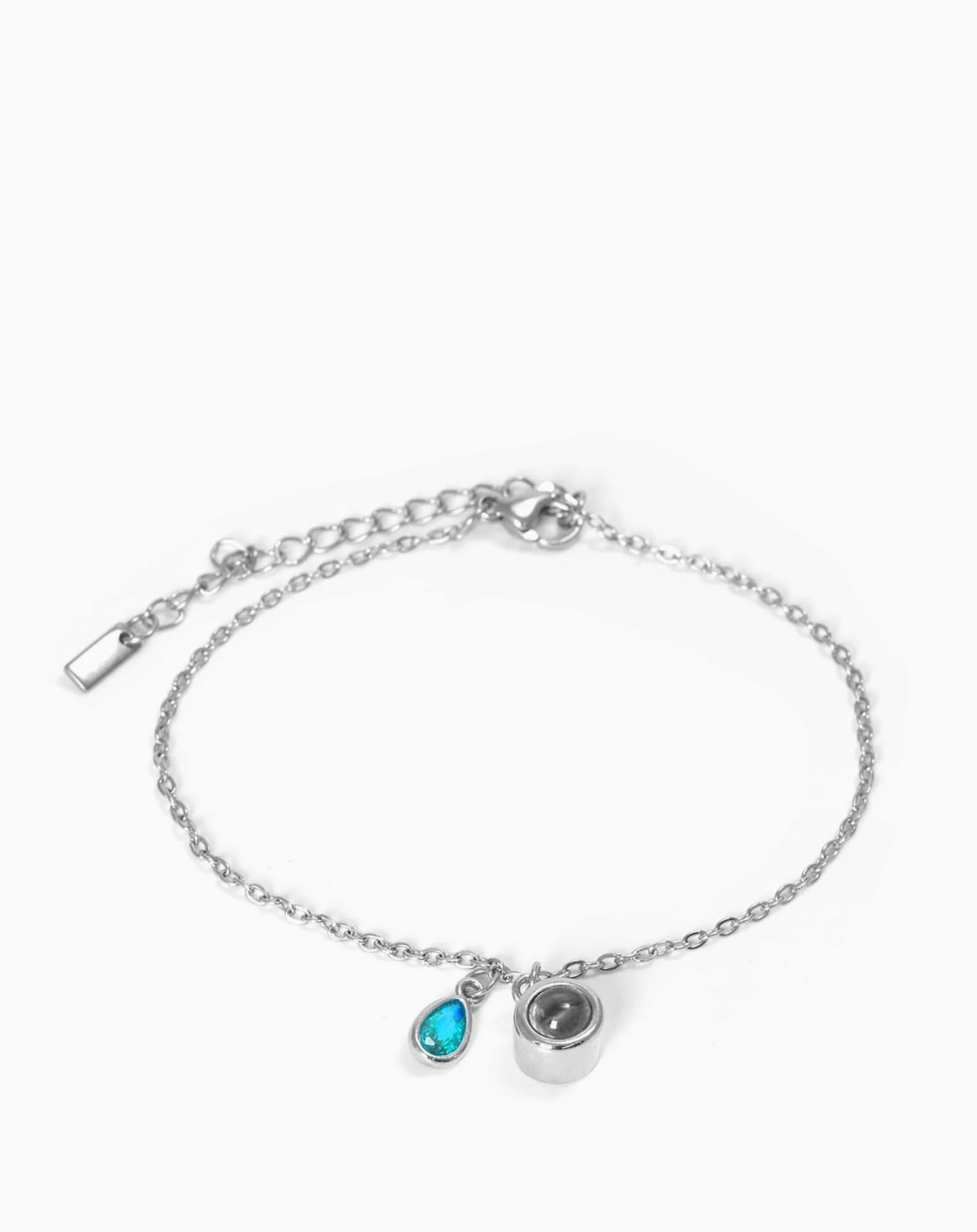 Pulsera con piedra del zodiaco en forma de gota de agua con proyección fotográfica