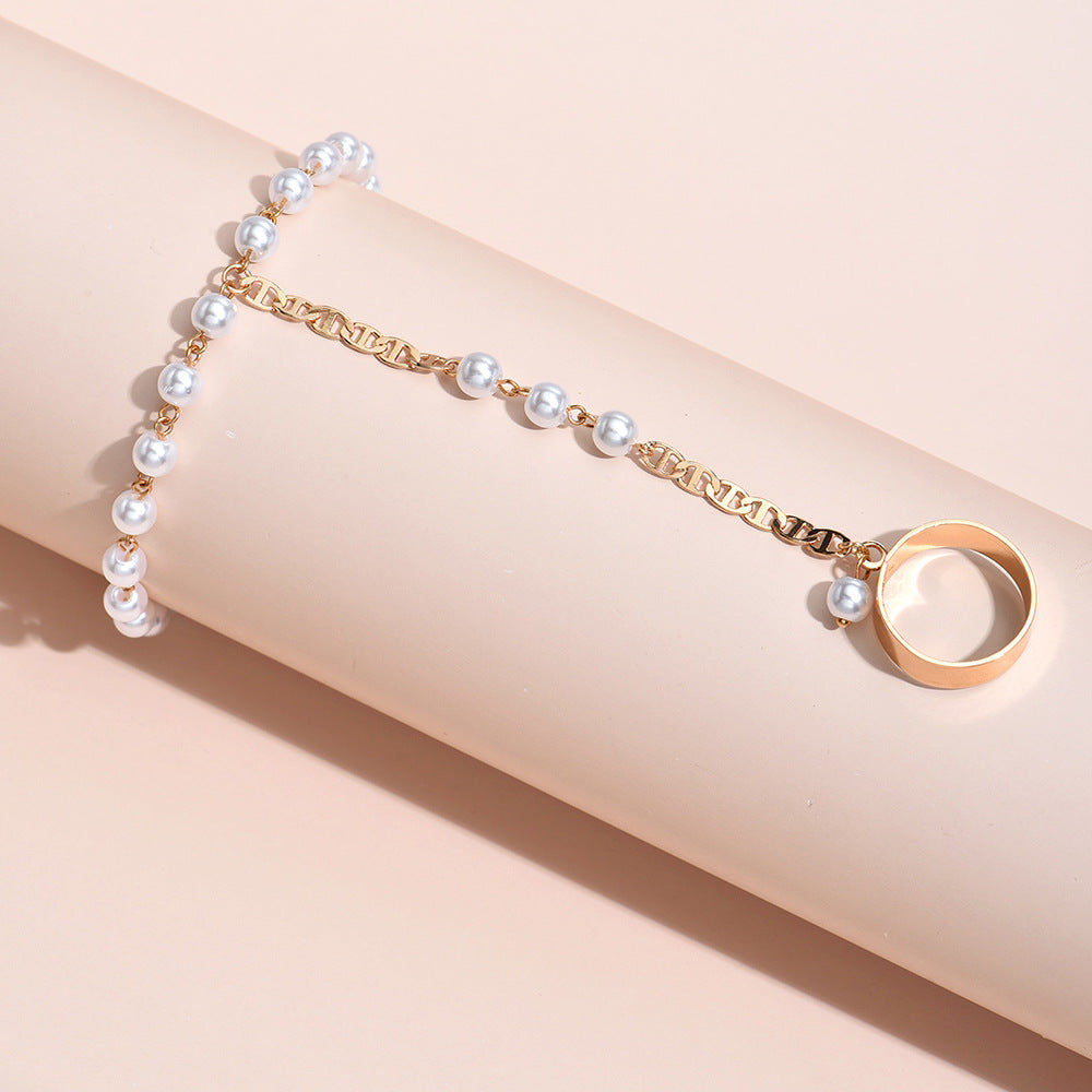 Simian pearl chain finger bracelet