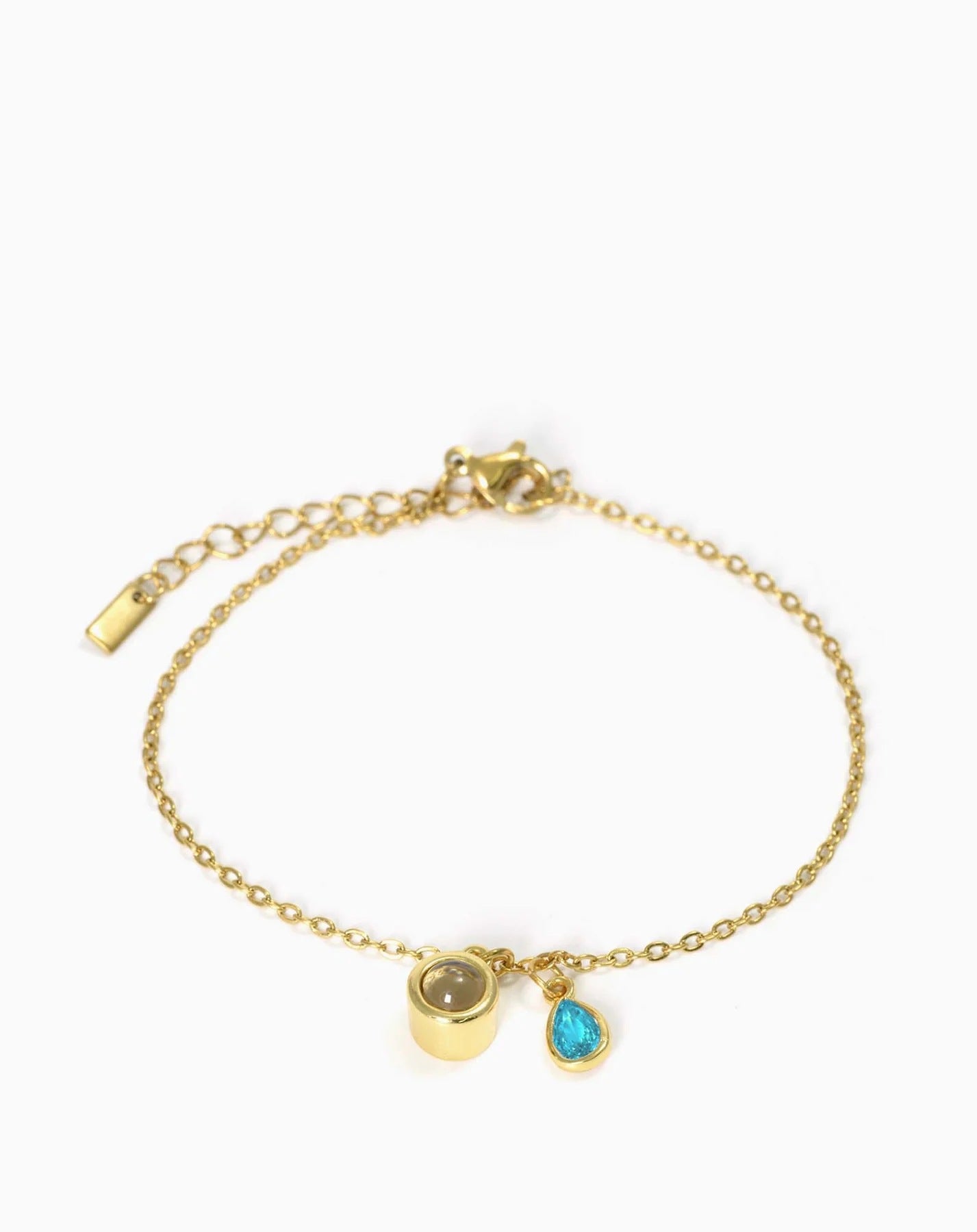 Pulsera con piedra del zodiaco en forma de gota de agua con proyección fotográfica