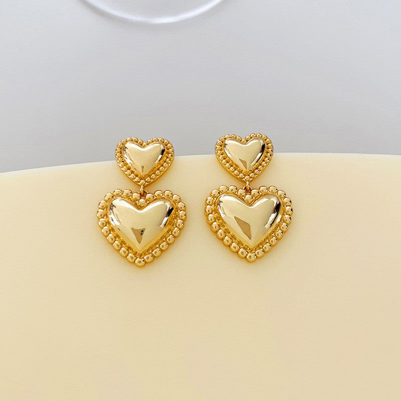 Collar de corazón con cuentas de mijo simple de alta gama para mujer