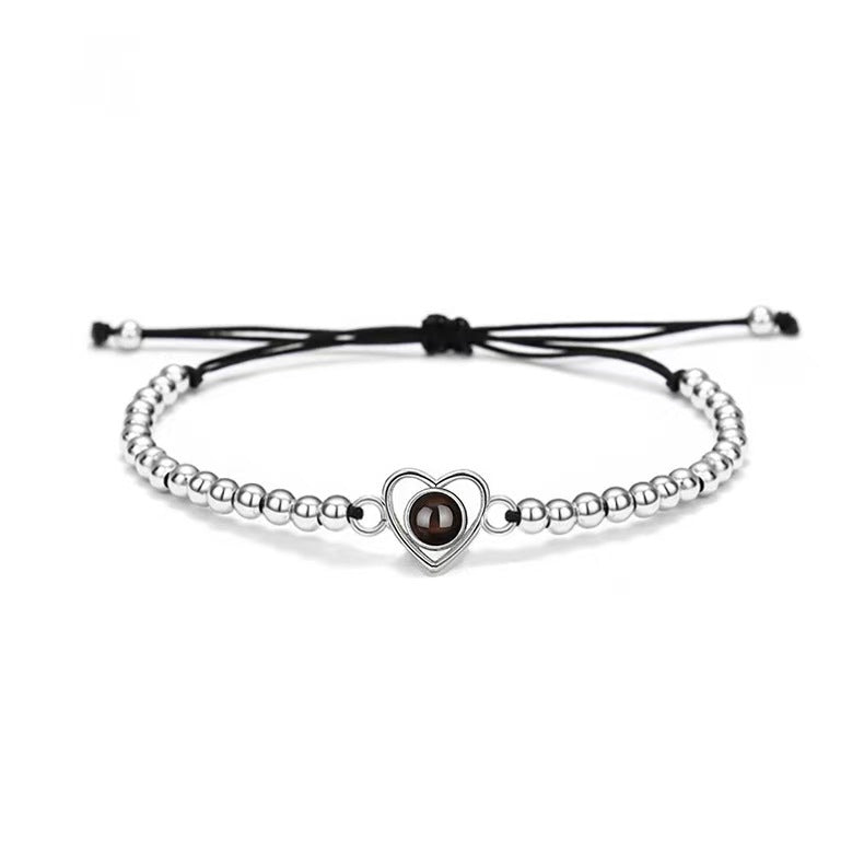 Pulsera de cuentas con foto y proyección de corazón de amor tejida