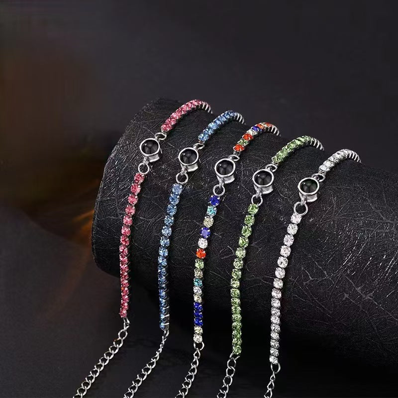 Pulsera fotográfica con proyección de diamantes de colores