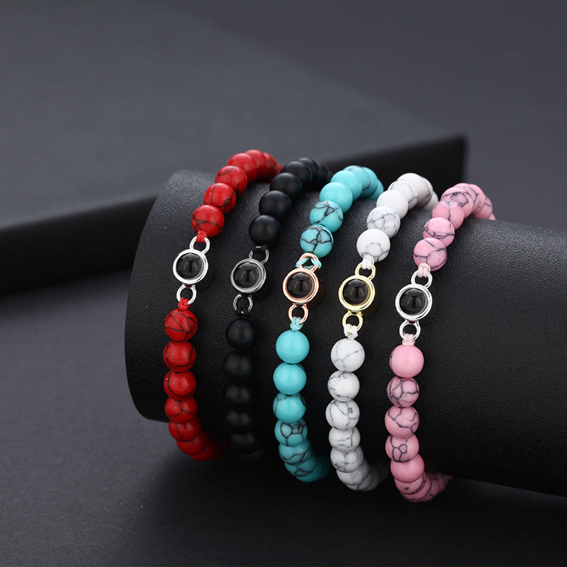Pulsera turquesa con proyección de fotos