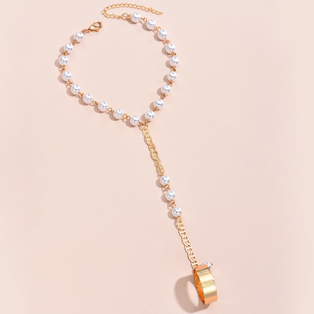 Simian pearl chain finger bracelet