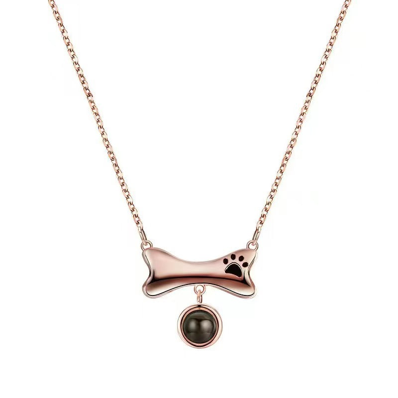 Collar con pata de perro con proyección de fotos