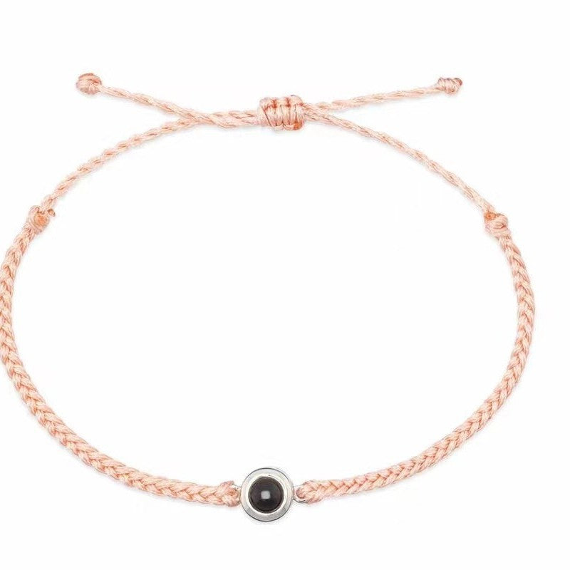Pulsera tejida con proyección de lenguaje fotográfico