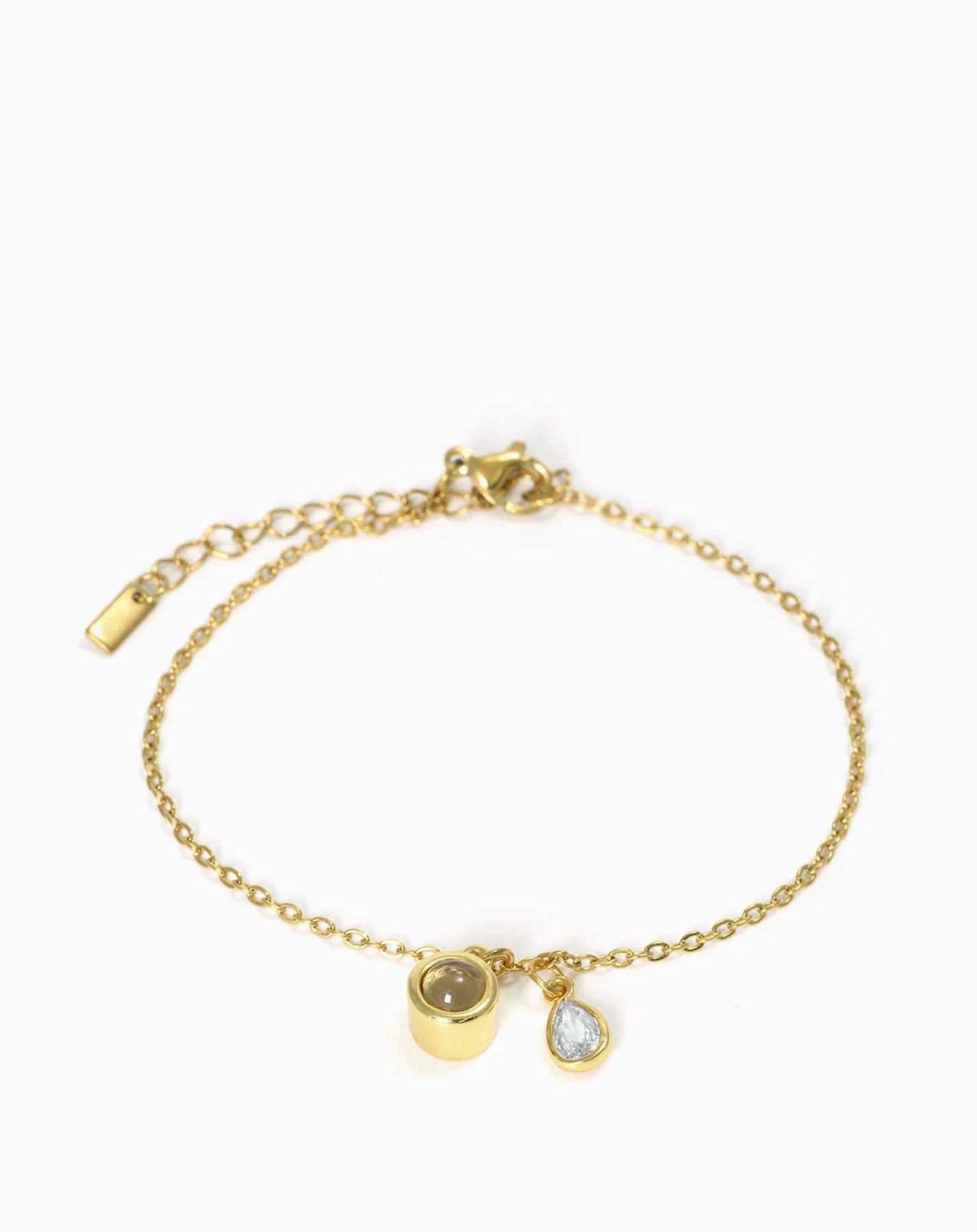 Pulsera con piedra del zodiaco en forma de gota de agua con proyección fotográfica