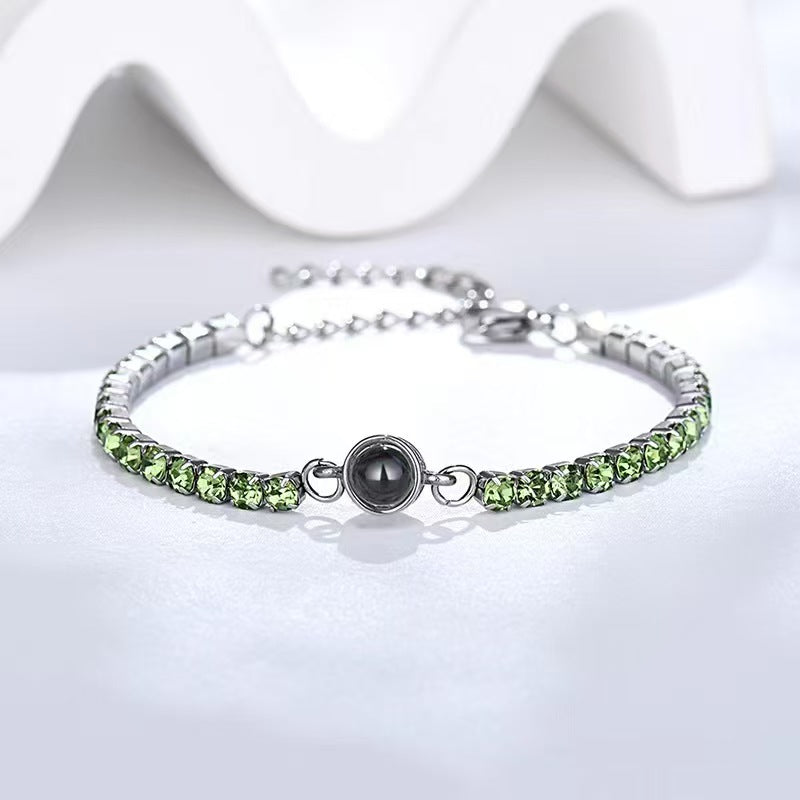 Pulsera fotográfica con proyección de diamantes de colores