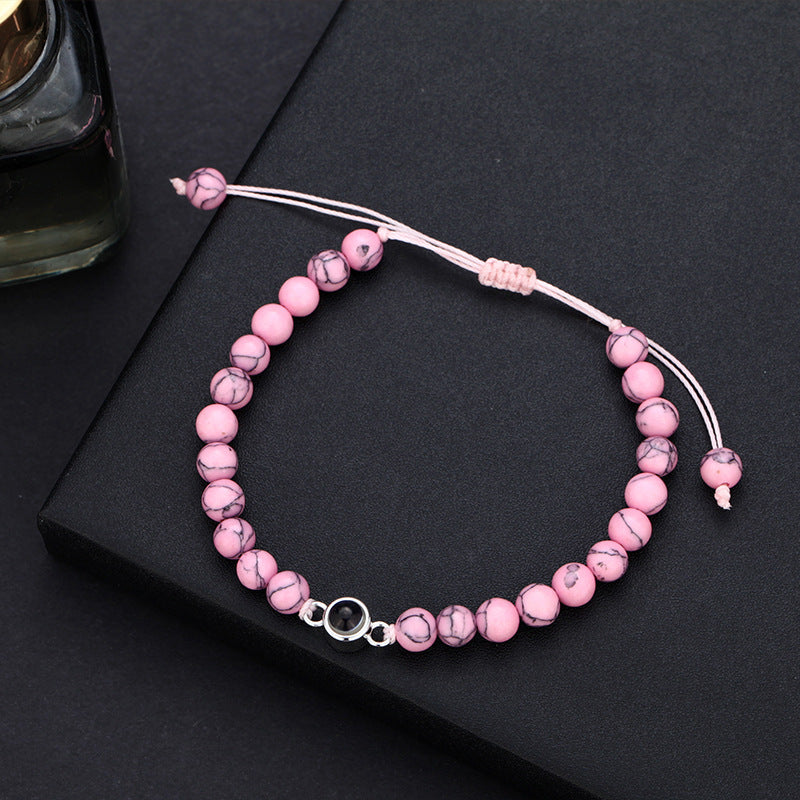 Pulsera turquesa con proyección de fotos