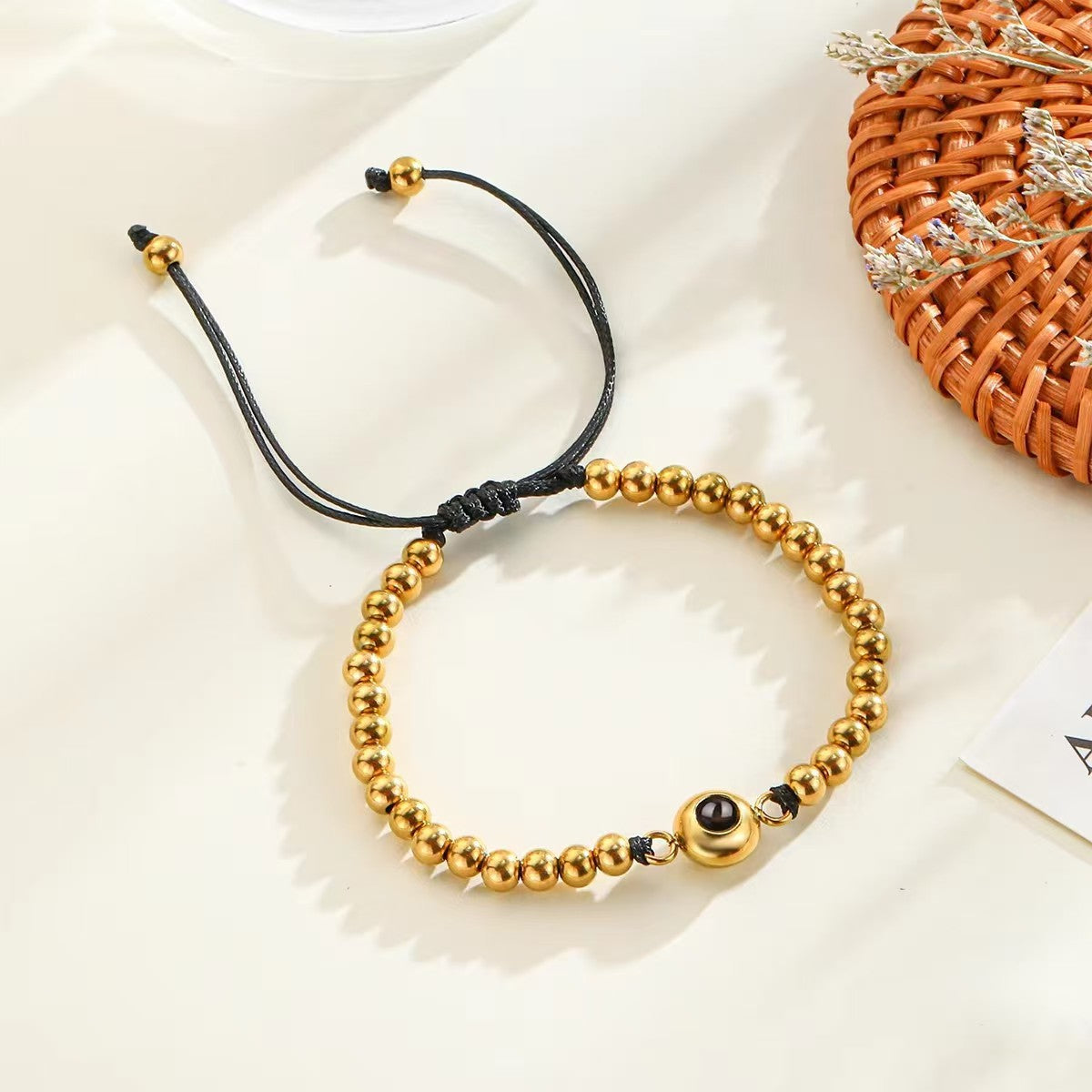 Pulsera de piedra magnética tejida con proyección fotográfica