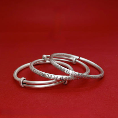 Pulsera de plata de ley con escrituras étnicas