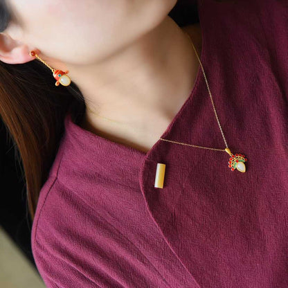 Luxury Hetian jade and silver jewelry collection with thick matte gold finish and traditional design