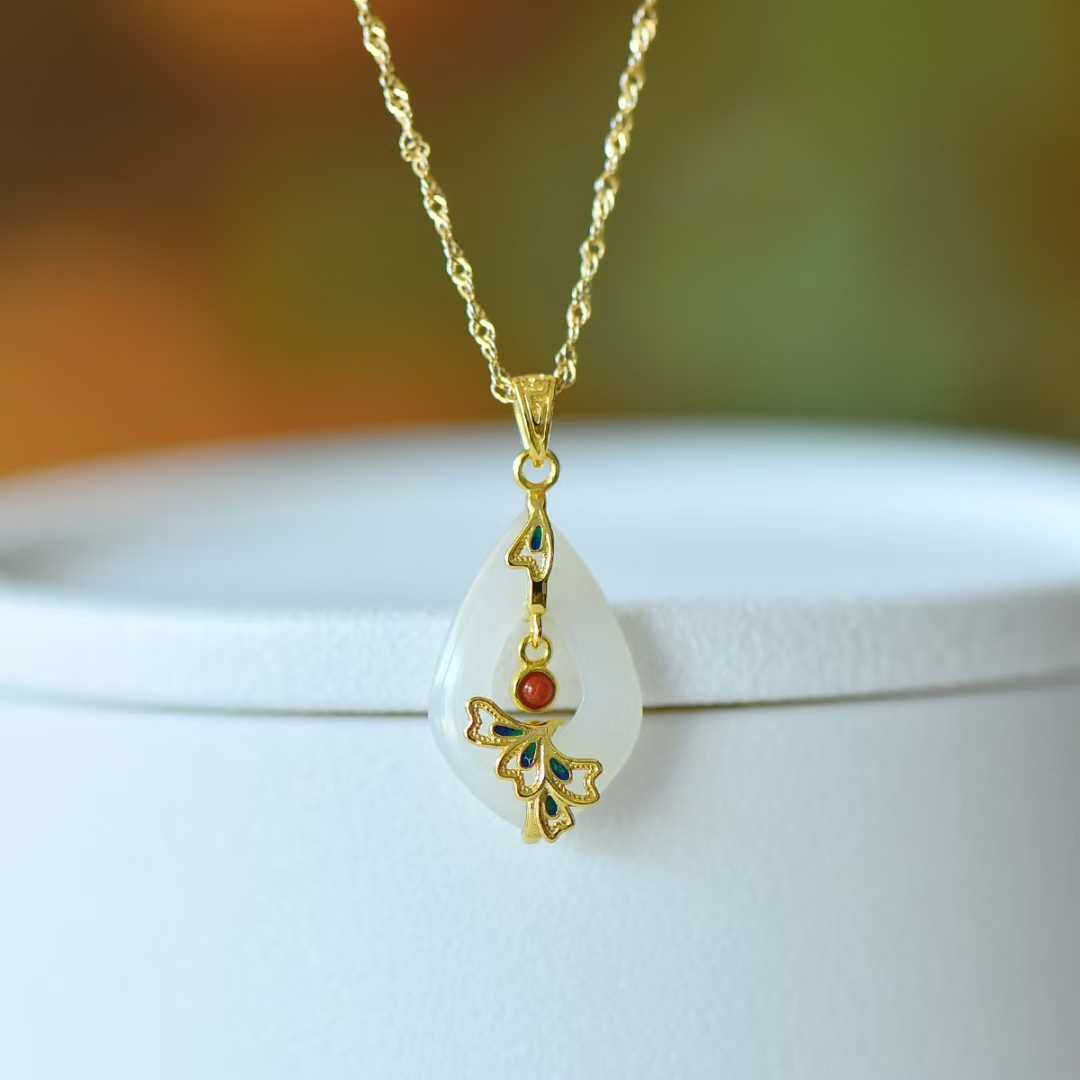 925 Silver Inlaid Hetian Nephrite Hollowed-Out Water Drop & Phoenix Pendant