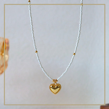 Collar de corazón con cuentas de mijo simple de alta gama para mujer 