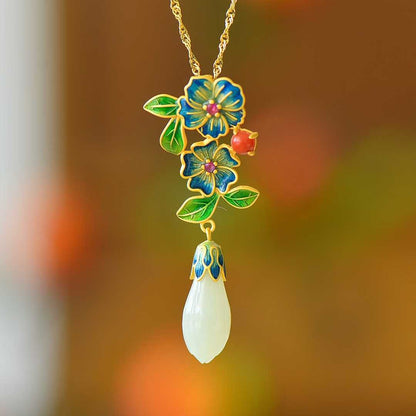Side view of blossoming fortune design Hetian nephrite retro pendant
