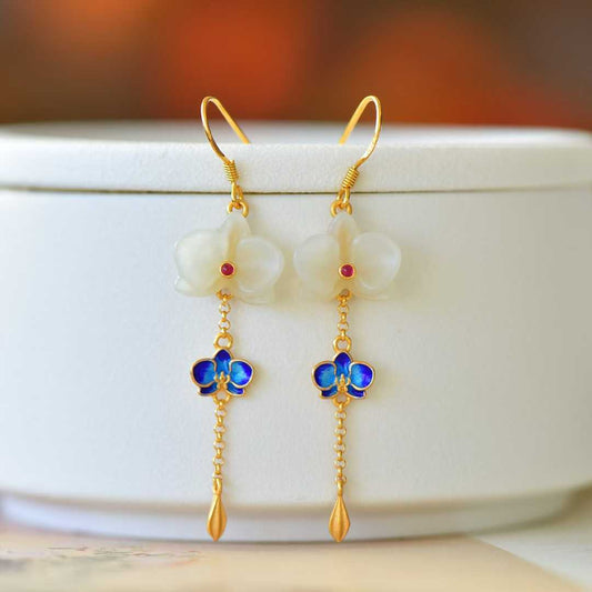 Close-up of dragon scale pattern on Hetian jade earrings - traditional design
