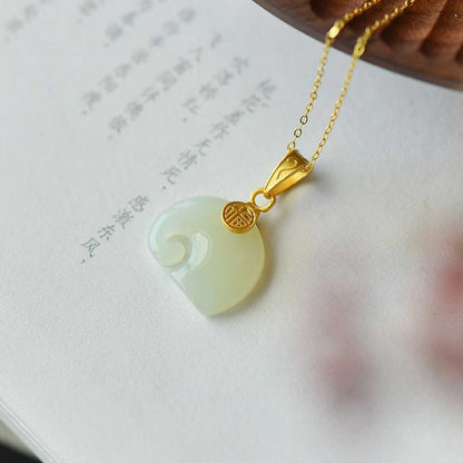 925 Silver-Inlaid Hetian Jade Pendant with "Auspicious Elephant" Design
