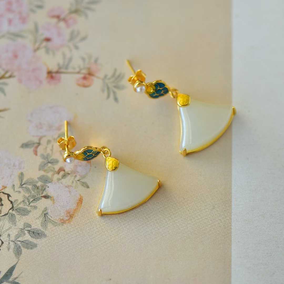 Side view of mini skirt style Hetian nephrite earrings - 925 silver