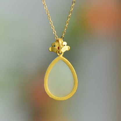 925 Silver-Inlaid Hetian Jade Pendant with "Butterfly & Flower" Design