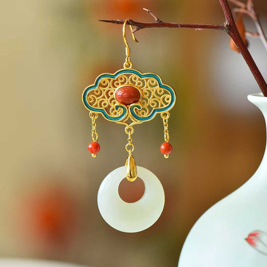 Close-up of Forbidden City inspired enamel pattern on Hetian jade earrings
