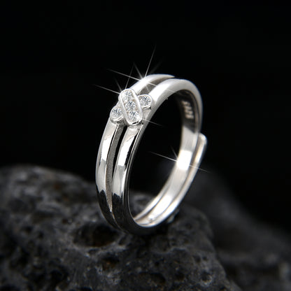 Anillo de nudo doble cruzado de diseño elegante