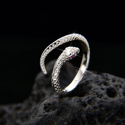 Anillo de pareja con serpiente y piedra de ojo rosa