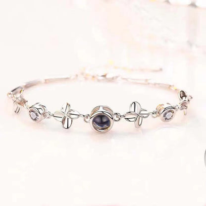 Pulsera de flores de cuatro hojas con proyección de fotos