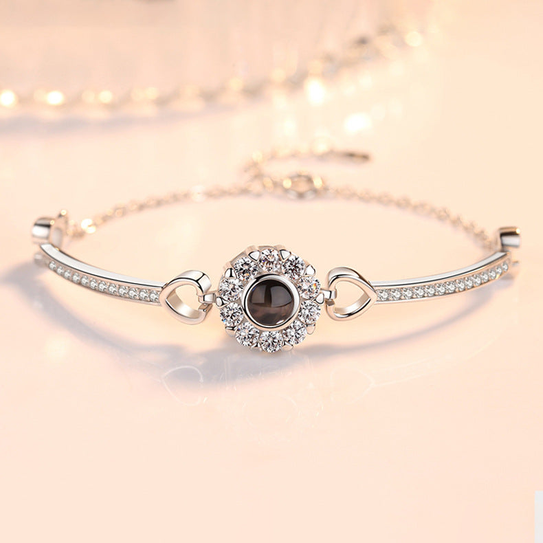 Pulsera de girasol con circonitas y proyección de fotos 