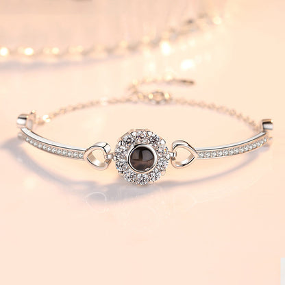 Pulsera de girasol con circonitas y proyección de fotos 