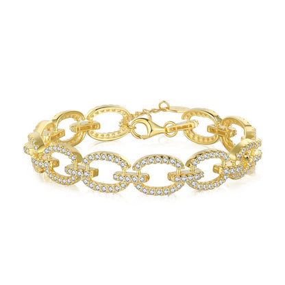Pulsera hueca de plata de ley con microincrustaciones de circonitas y diamantes.