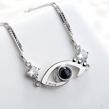 Pulsera de ojo de demonio con proyección de fotos 