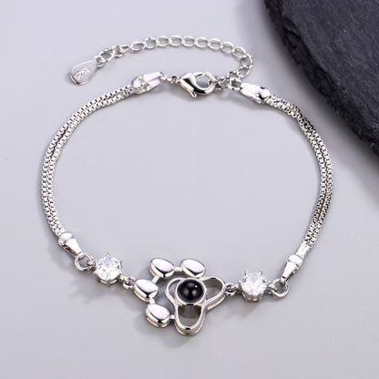 Pulsera con foto y proyección de huellas de perro 