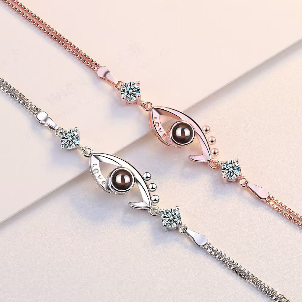 Pulsera de ojo de demonio con proyección de fotos 