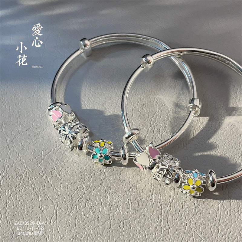 China A pair of sterling silver heart circle bracelets for children