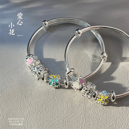 China A pair of sterling silver heart circle bracelets for children